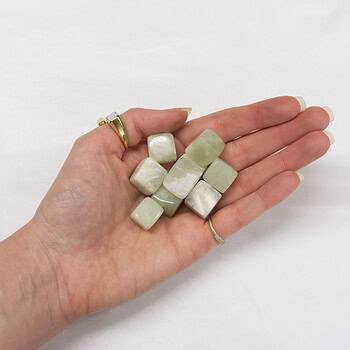A handful of Jade tumbles