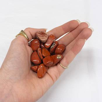 A handful of red jasper tumbles