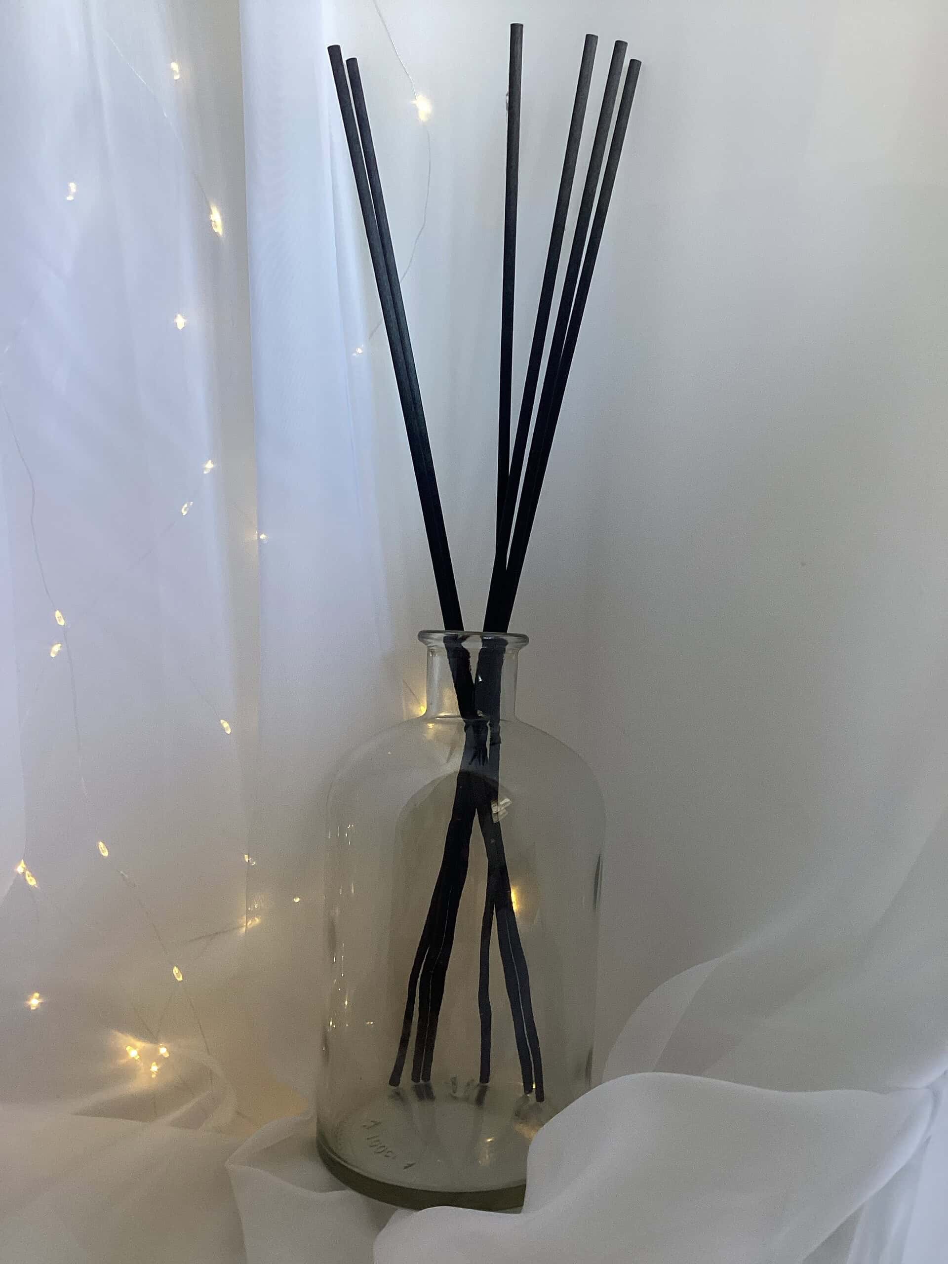 768f7942 e453 4f3a 957f 8ac814ab1886 1743 0000042ad76601cf file scaled a glass vase with sticks in it for reed diffuser