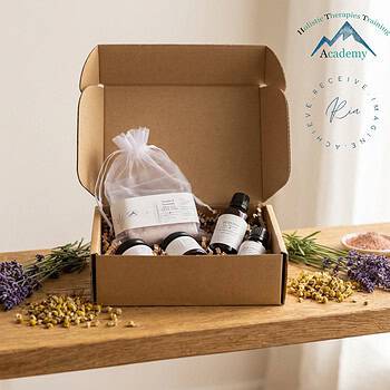 Holistic acadmy training kit in a kraft box on a shelf